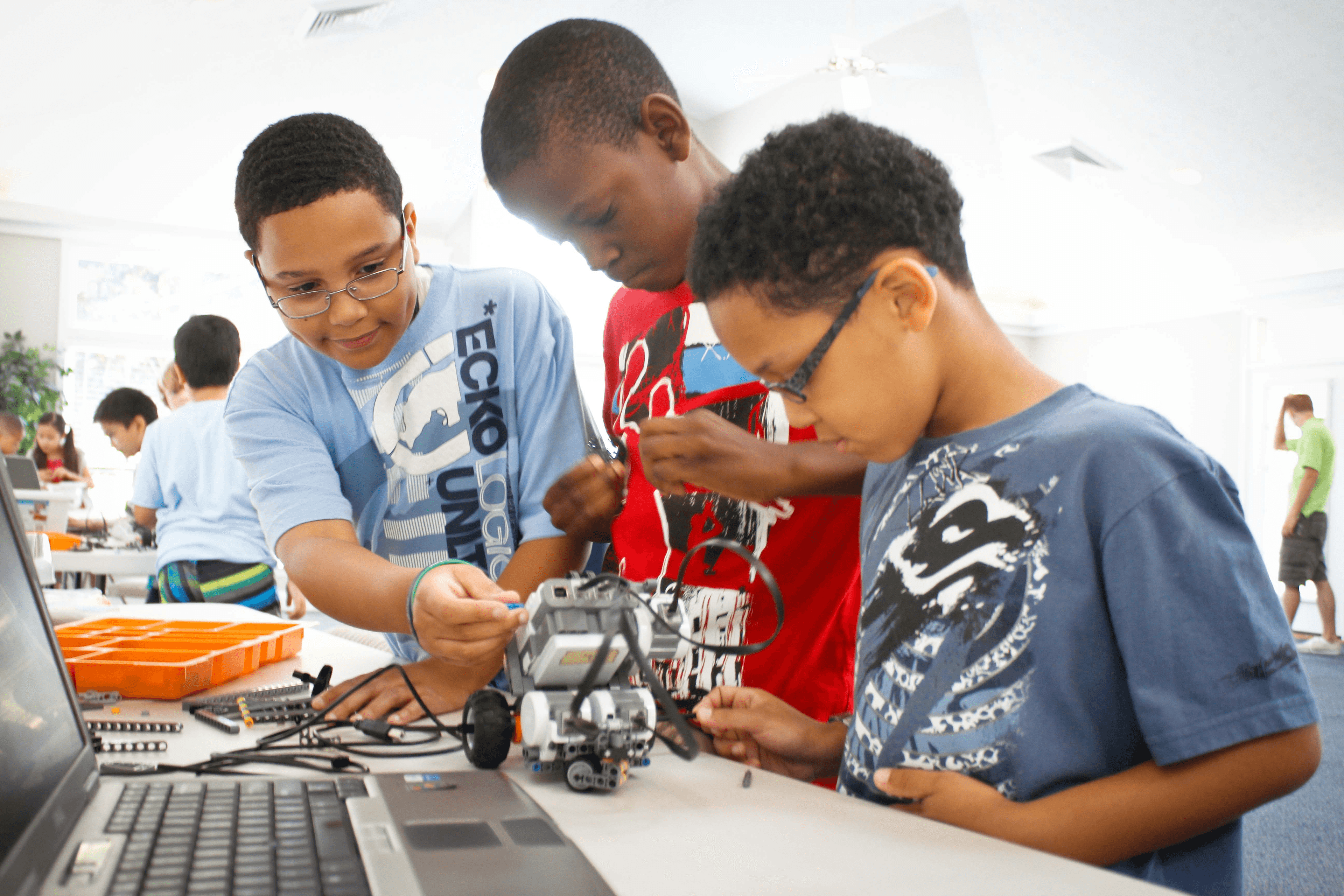 Operators collaborating around a connected hardware workstation